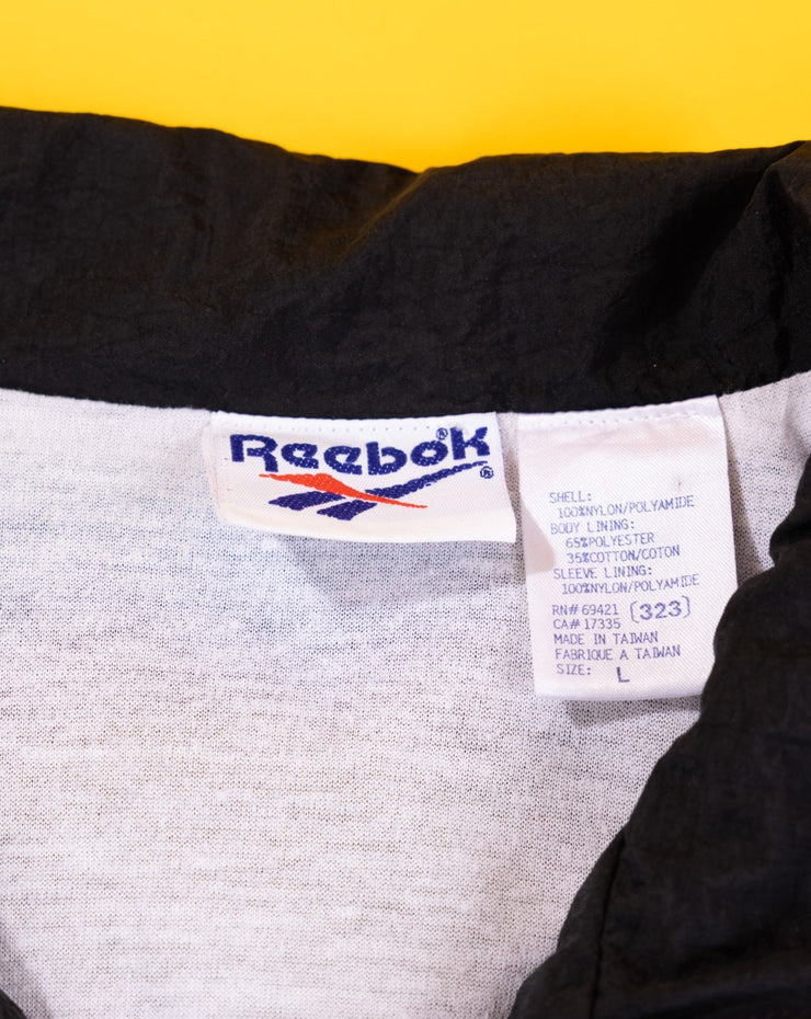 Vintage 90s Reebok Windbreaker (purple)