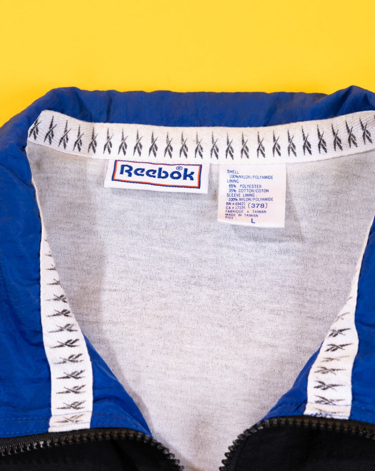 Vintage 90s Reebok Windbreaker (Black/Blue/Red logo)