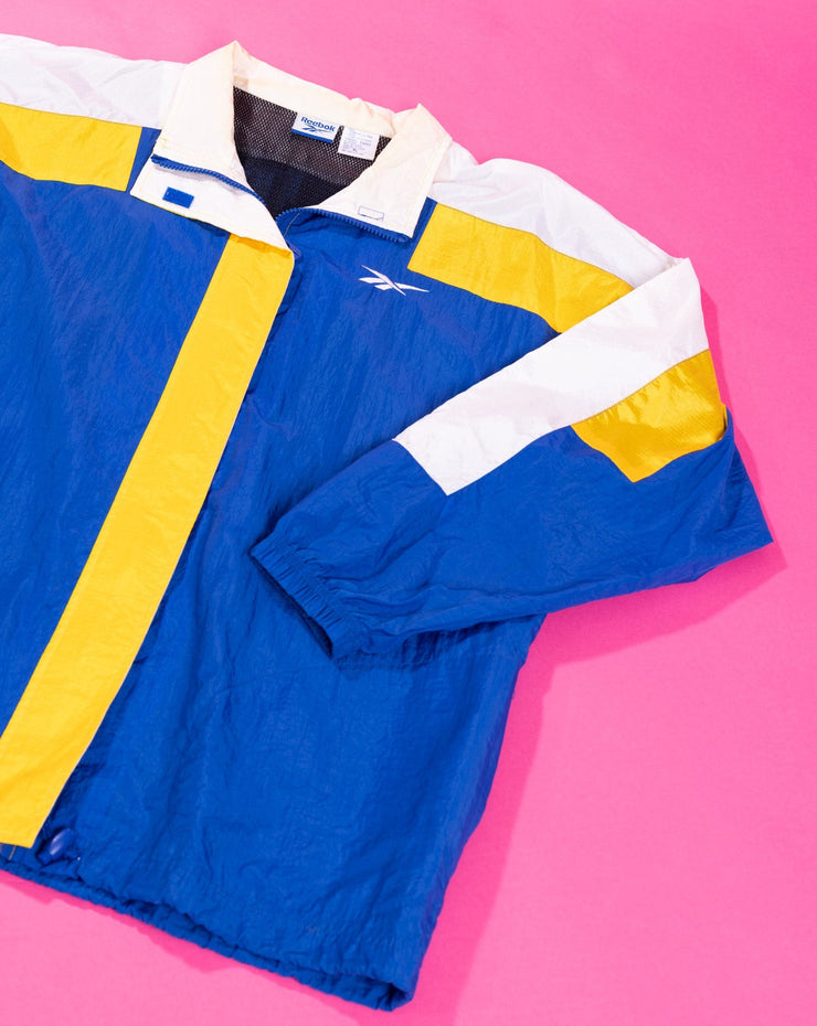 Vintage 90s Reebok Windbreaker Jacket (yellow/blue)